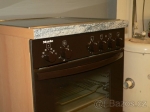 Hnědý vestavný sporák Miele H310E 